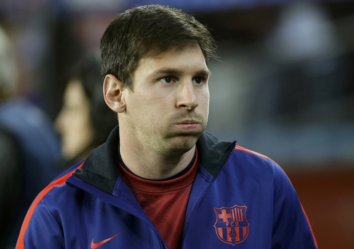 Barcelona's Lionel Messi reacts before his Champions League quarter-final second leg soccer match against Paris St Germain in Barcelona